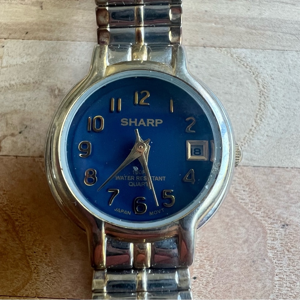 Sharp ladies two-toned blue dial dress watch NEW BATTERY